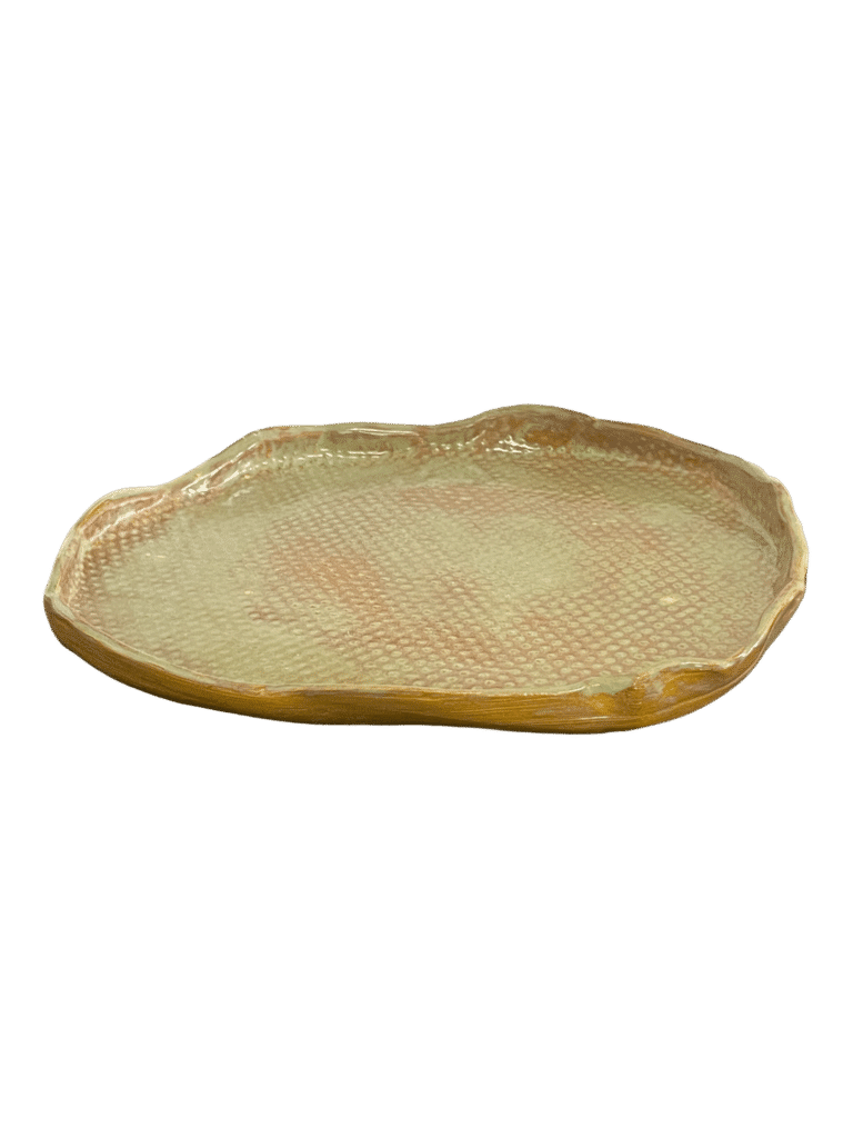 This platter is hand built and glazed - it is perfect for adding a pop of green to your table. Handmade in Ganmain by Australian artist Jody Graham.