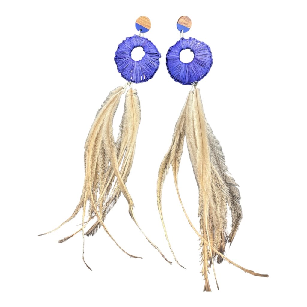 Immerse yourself in the "Ocean Whispers" earrings from the NAIDOC Collection by Gomeroi artist Debbie Wood. Hand-woven with blue raffia and emu feathers, these earrings celebrate Indigenous artistry.