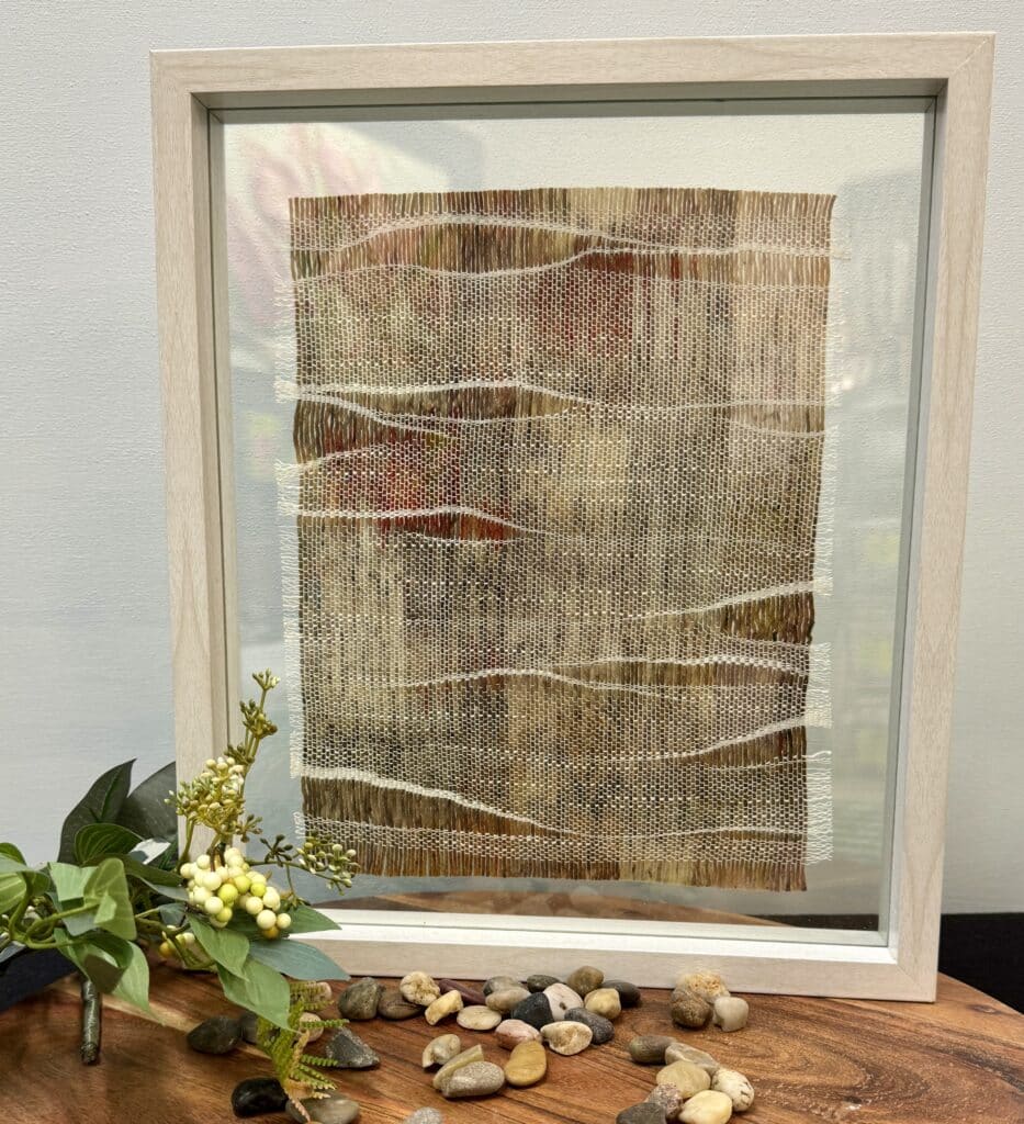 Discover "Bushland Serenity" by Ashculme Textiles, a stunning textile art piece using hand-reared alpaca wool and natural dyes, capturing the essence of the Australian bushland. Perfect for adding a touch of nature to your home decor.