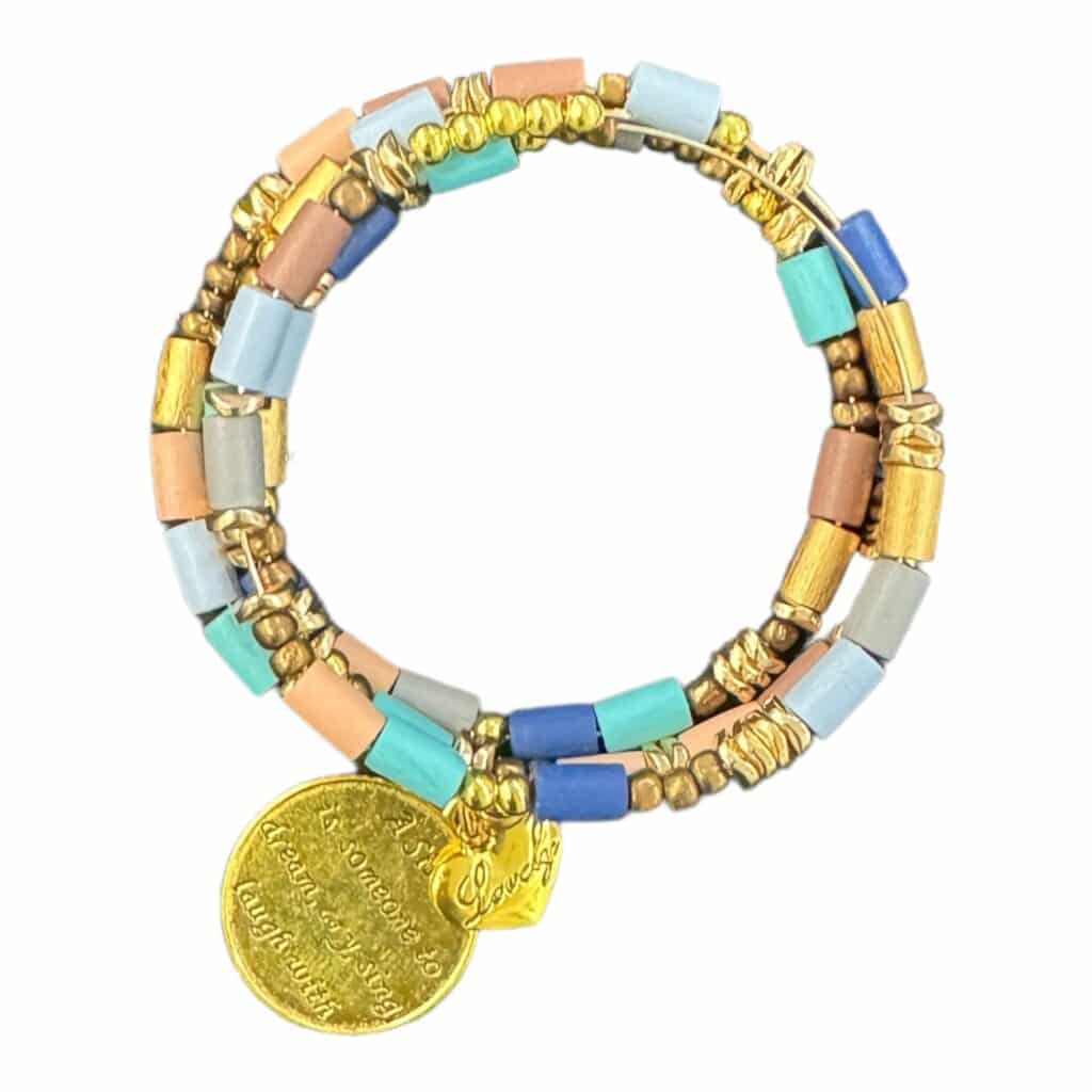 Handmade "A Sister" memory wire bracelet featuring multicolored gemstones, crystals, and a gold-plated charm. A perfect gift to celebrate the bond of sisterhood.