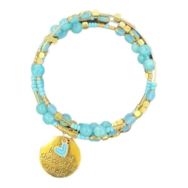 Empower yourself with the handmade "She Believed She Could So She Did - Blue" memory wire bracelet, featuring turquoise gemstones, crystals, and a gold-plated charm.