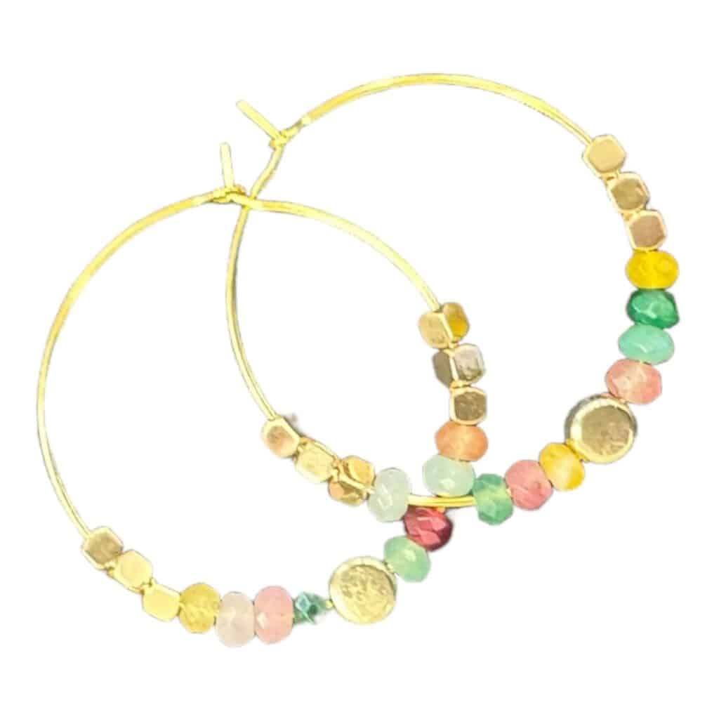 Discover the elegance of the Pastel Harmony earrings by Maggie Deall. Features a mix of pastel beads with golden accents, perfect for any occasion.