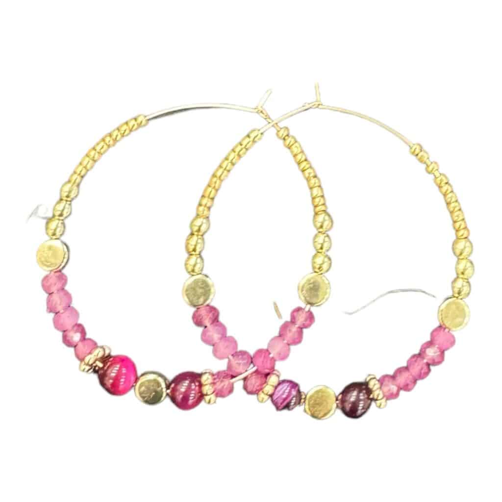 Embrace the beauty of spring with Blossom Pink earrings by Maggie Deall. Features a mix of pink and berry-toned beads with golden accents.