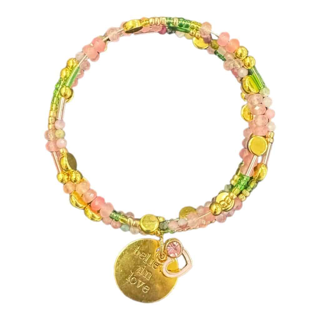 Handmade "Believe in Love" memory wire bracelet featuring pink and green gemstones, crystals, and a gold-plated charm. A beautiful celebration of love.