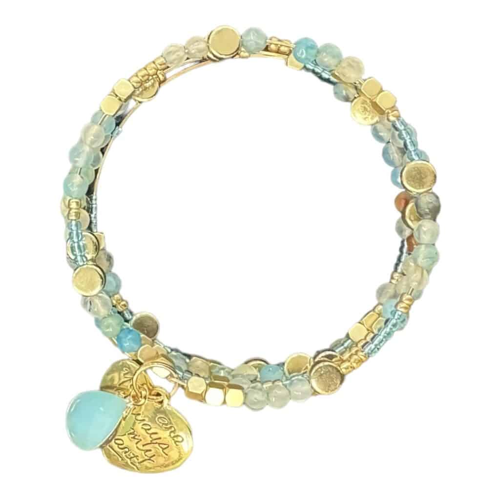 Handmade "Always in My Heart" memory wire bracelet featuring gemstones, crystals, and a gold-plated heart charm. A meaningful and elegant keepsake perfect for any occasion.