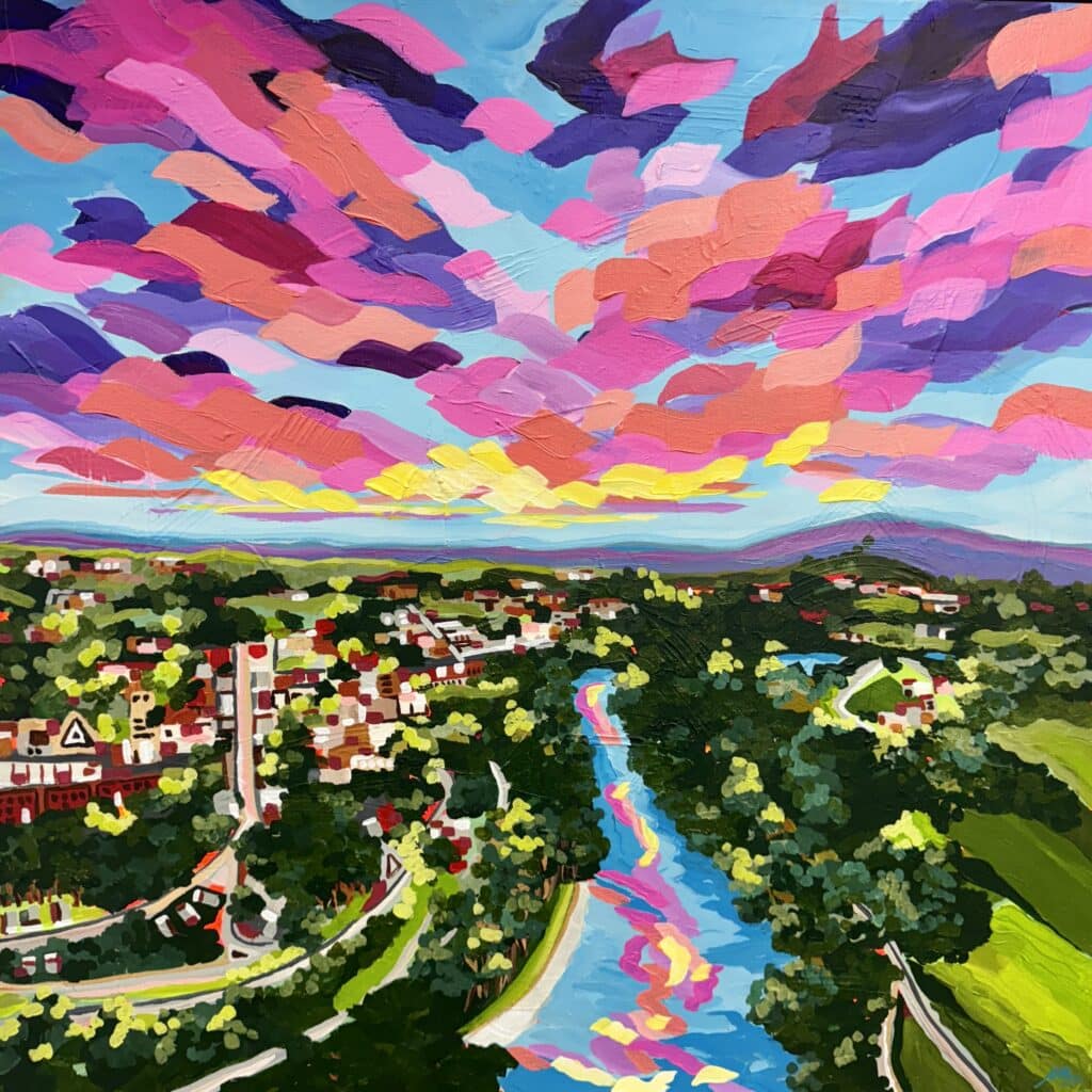 Discover Maggie Deall’s Sunlight on the River, an aerial view of Wagga Wagga and the Murrumbidgee River. This vibrant artwork captures the beauty of the Australian landscape with a kaleidoscope of colours at sunset. Perfect for adding warmth and energy to your space.