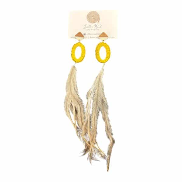 Shine with Debbie Wood's "Golden Glow" earrings, handwoven with bright yellow raffia and adorned with ethically sourced emu feathers. Playful and eye-catching!