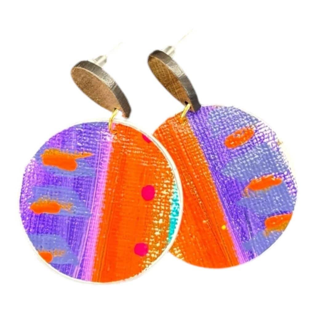 Turn heads with Vibrant Violets earrings by Lindy Farley – unique, hand-painted statement pieces made from upcycled coffee pods.