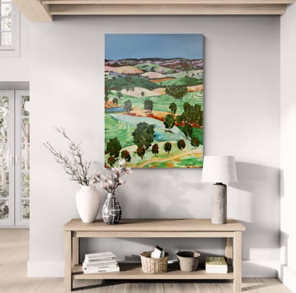 "Welcome Home" by Rebecca Gornall (90cm x 120cm, Acrylic on Canvas) captures the rolling hills and vibrant colours of the Australian countryside in a dynamic, inviting landscape.