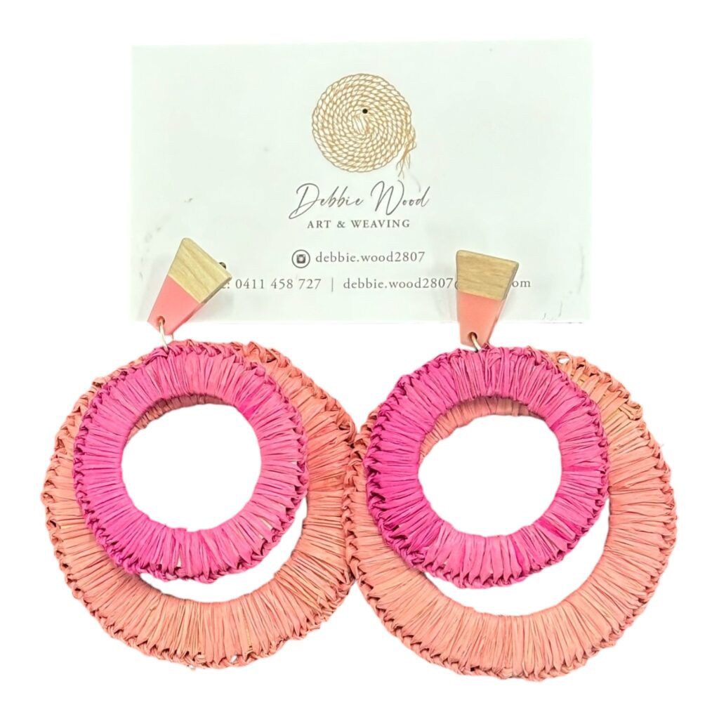 Desert Rose handwoven earrings by Gomeroi artist Debbie Wood. Soft pink and peach raffia creates a romantic, nature-inspired design.